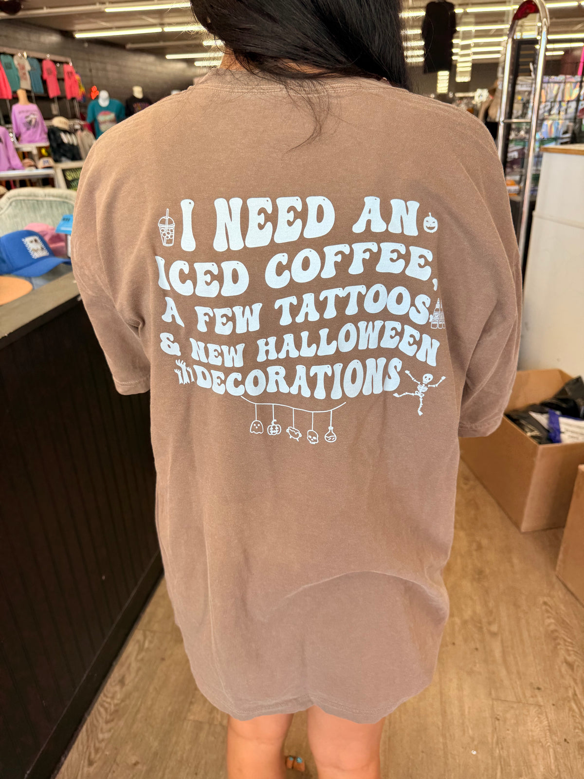 I need an iced coffee , Halloween decorations , a few tattoos tee or sweatshirt