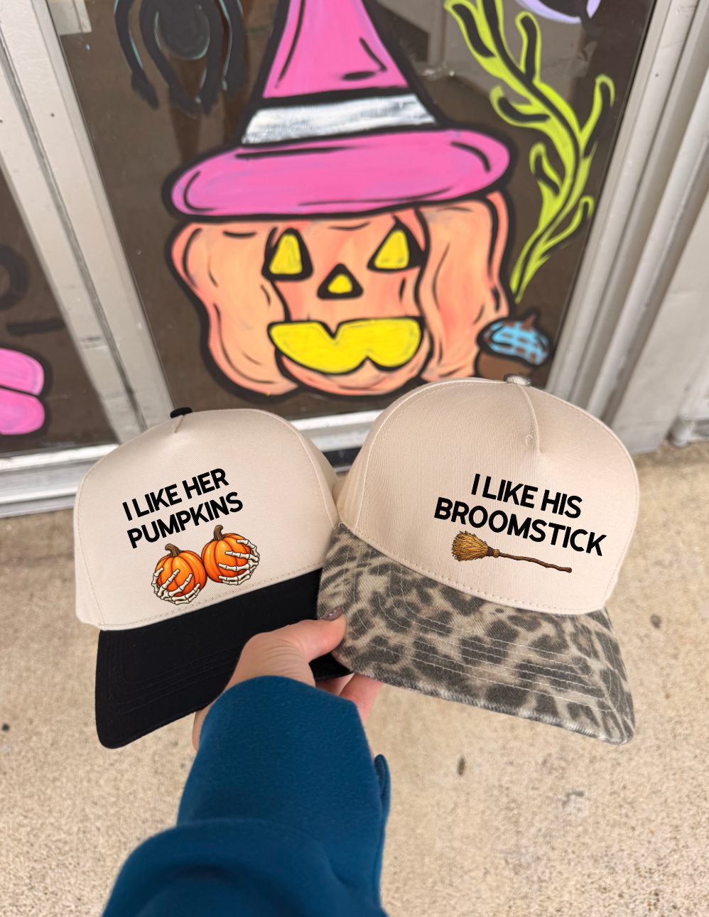 I like her pumpkins or I like his broomstick hat
