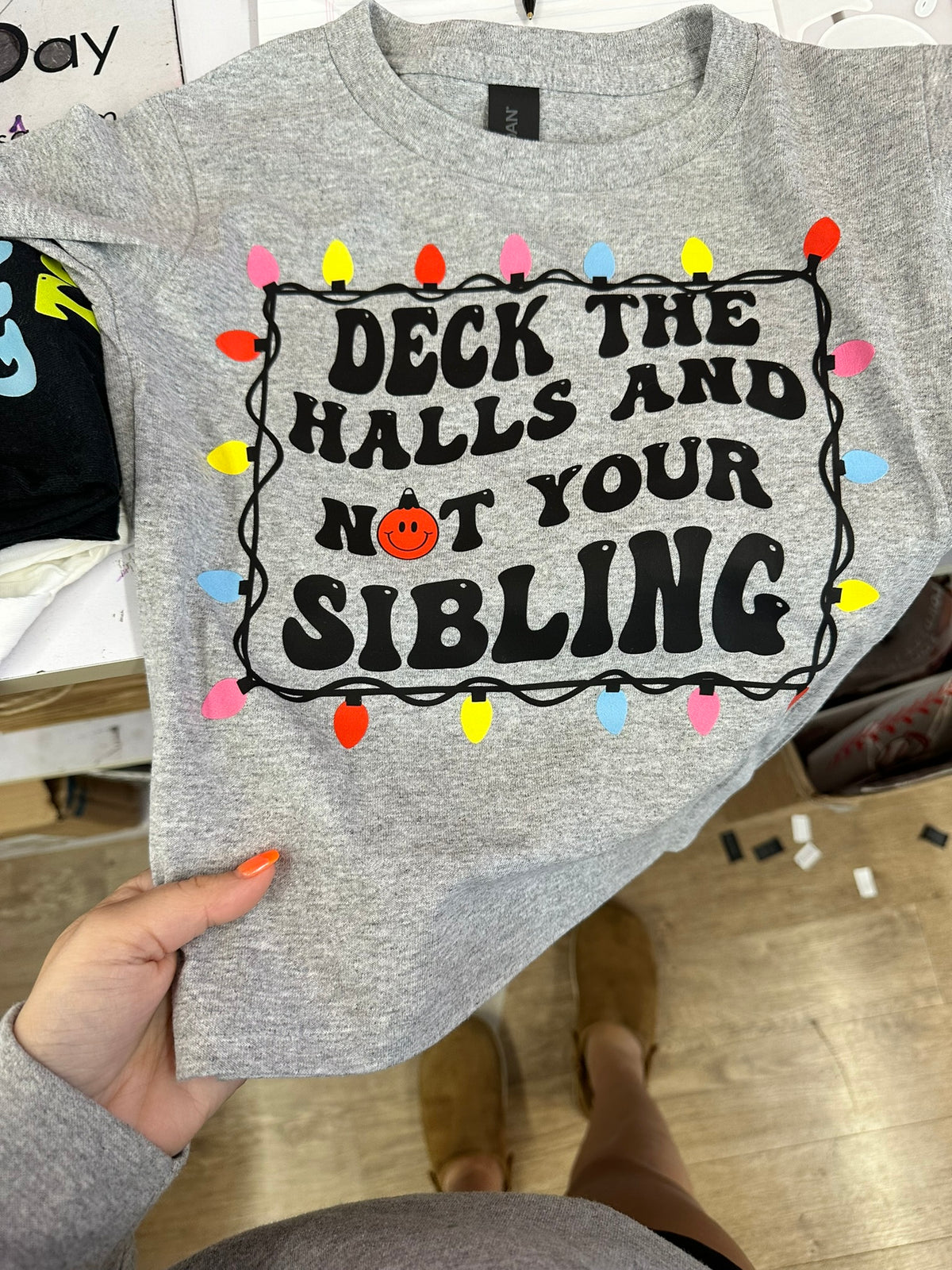 deck the halls and not your sibling tee