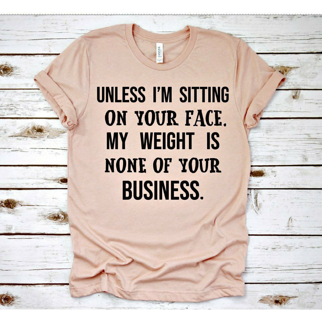 weight sitting on face tee or sweatshirt