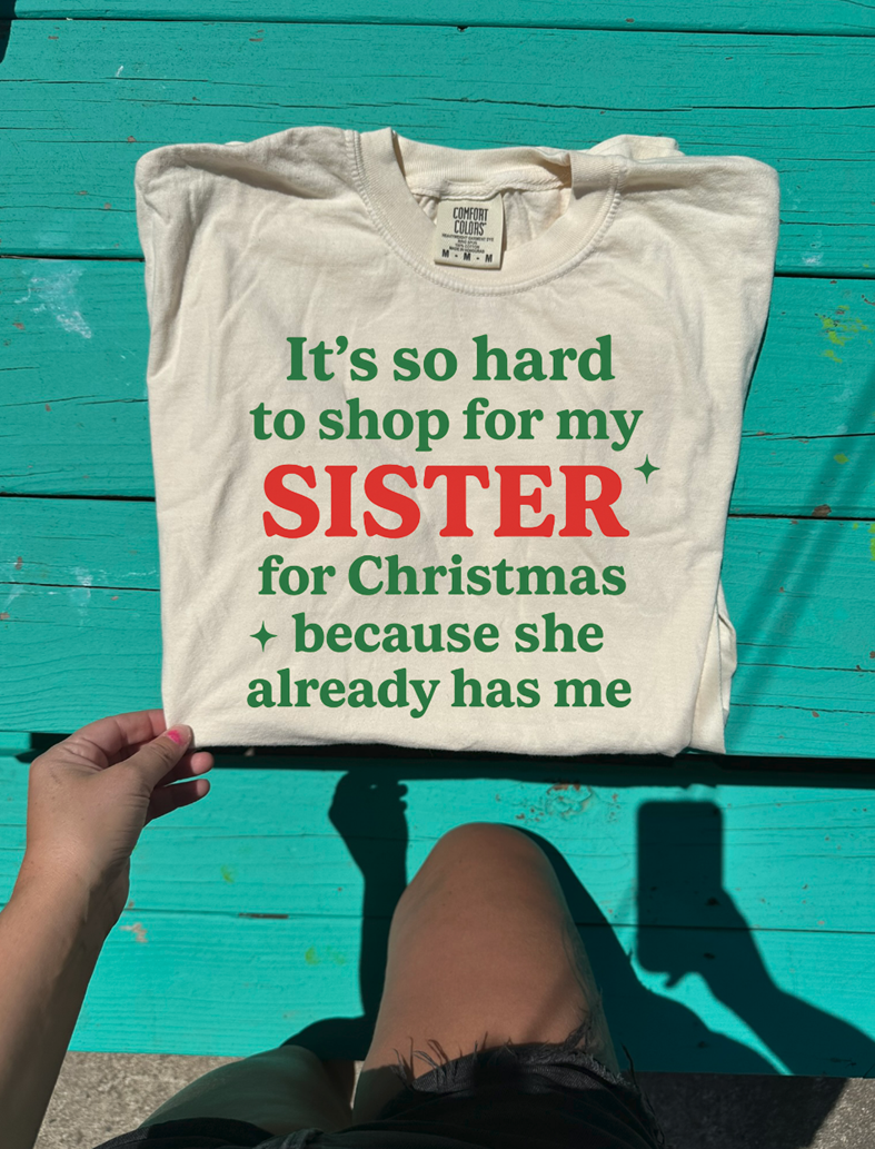 hard to shop for my sister she has me Christmas tee or sweatshirt